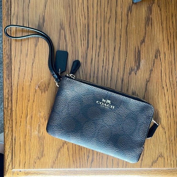 Coach Handbags - Coach Wristlet in Brown and Black